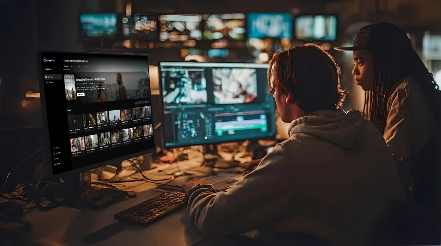 Production collaborators reviewing ScreenKey in an editing room